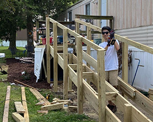 Image of people working on deck ramp